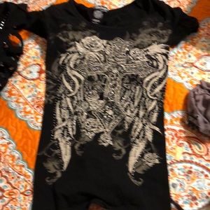 T-shirt with cross on front heart on the back braided detailing on back